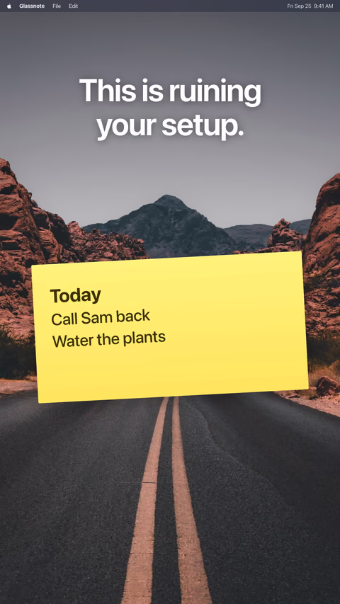 A yellow sticky note on a desert road wallpaper under the words: This is ruining your setup.